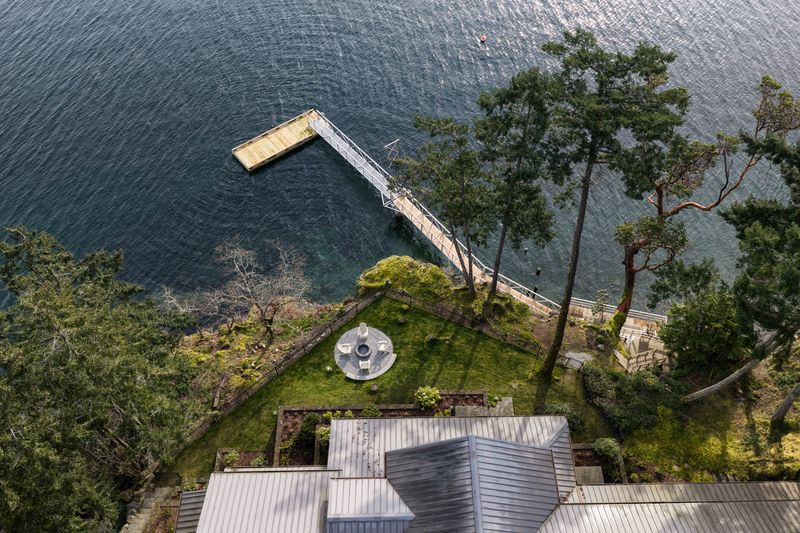 Aerial view of the dock, lawn and roof at BrightWoods on Salt Spring Island