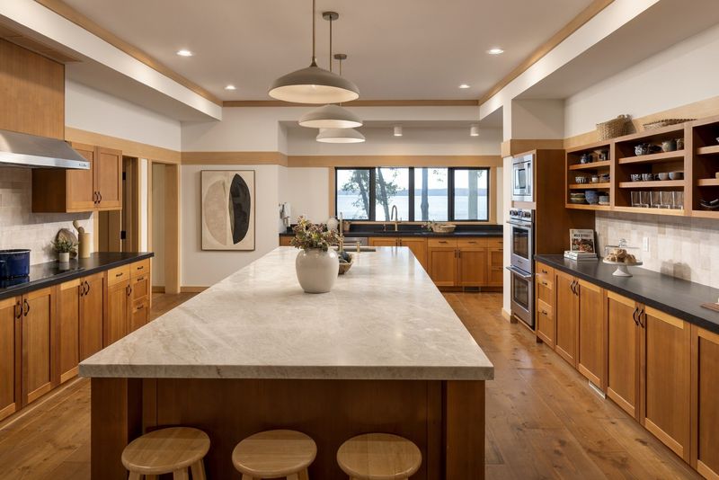 Kitchen island and wide-plank Douglas Fir floor at BrightWoods